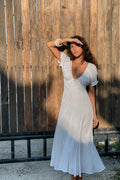 Robe mi-longue en gaze avec godets blanc