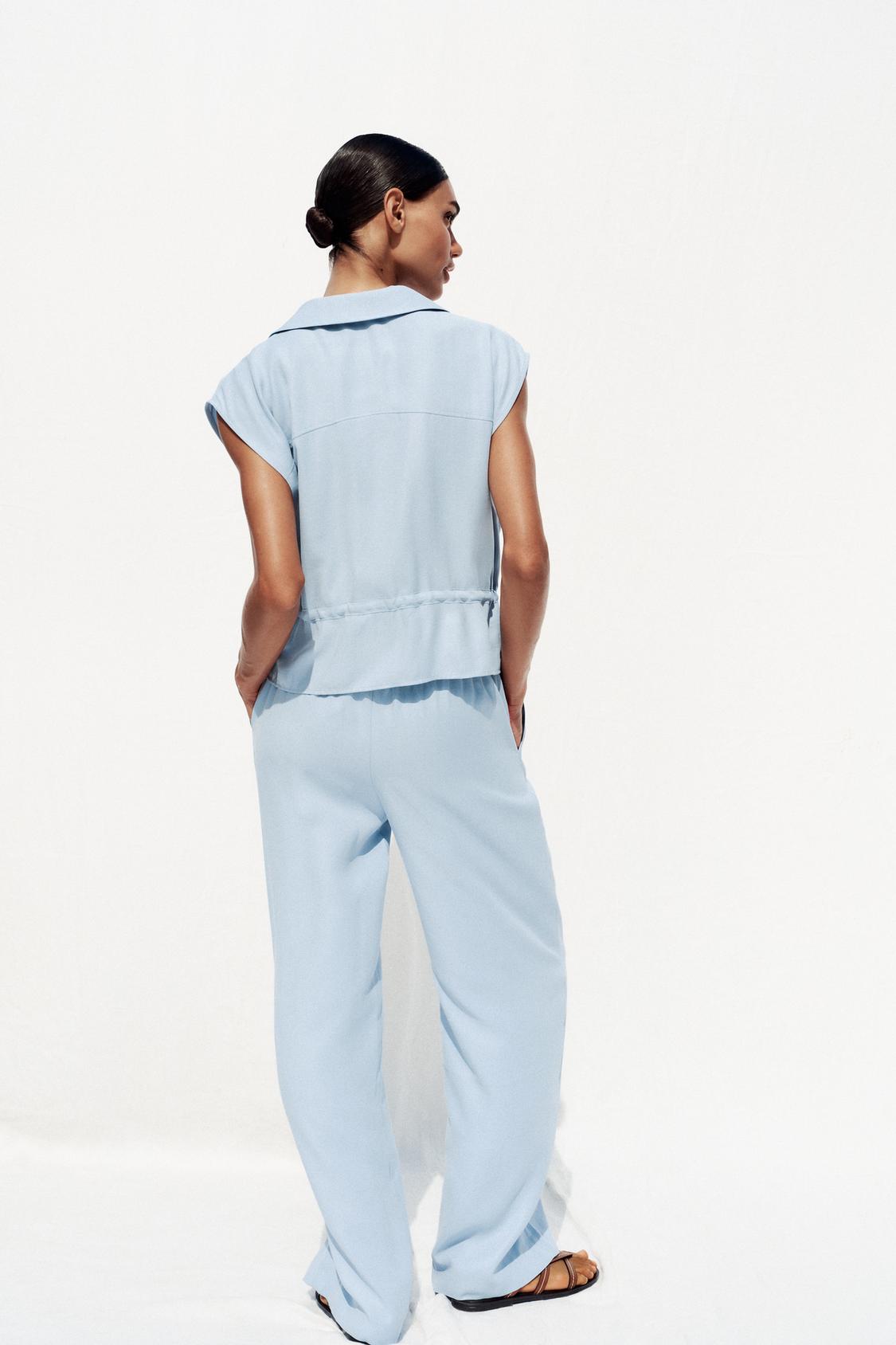 ÄRMELLOSE SAFARI-BLUSE MIT KORDBUND