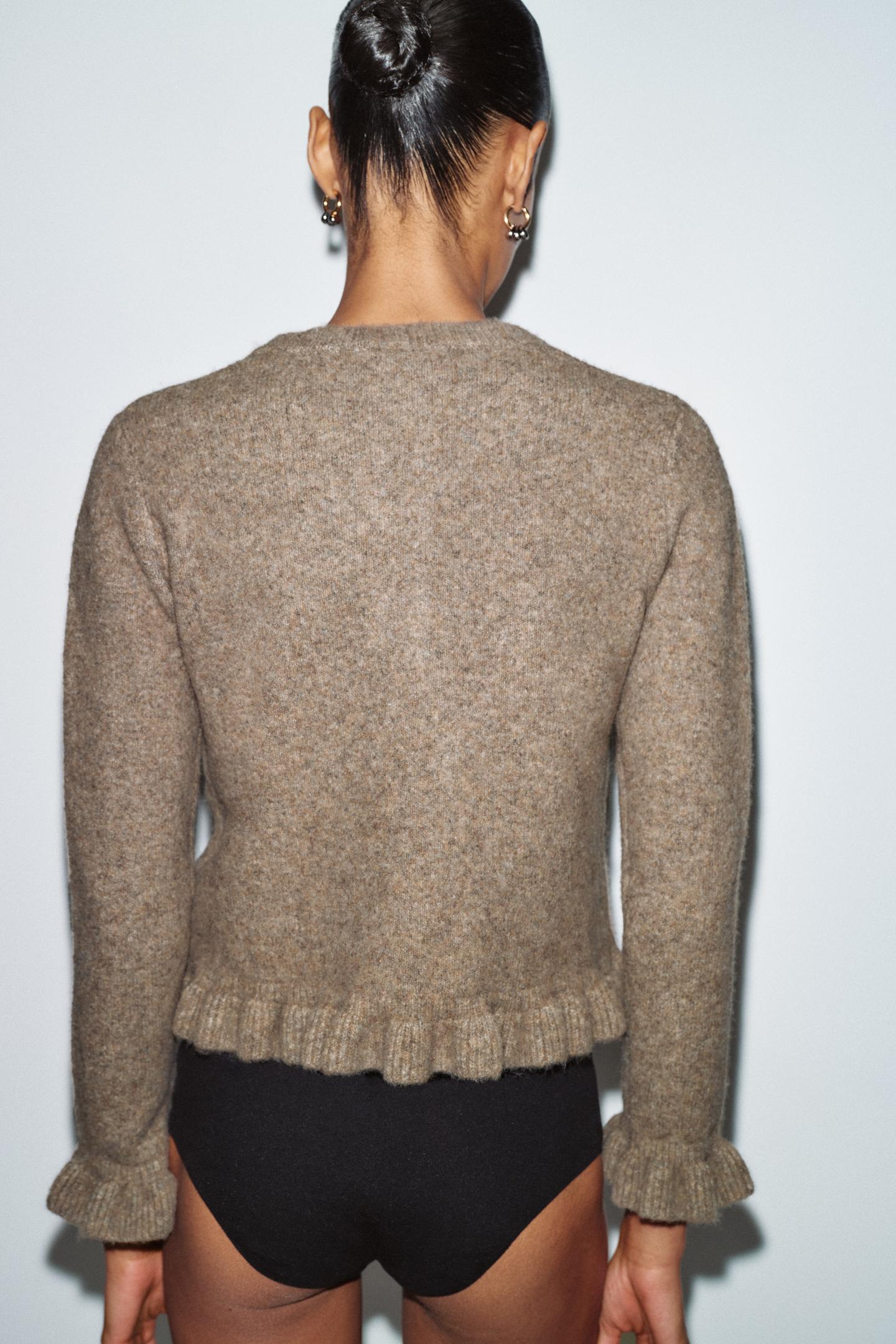 GILET EN MAILLE UNIE À VOLANTS