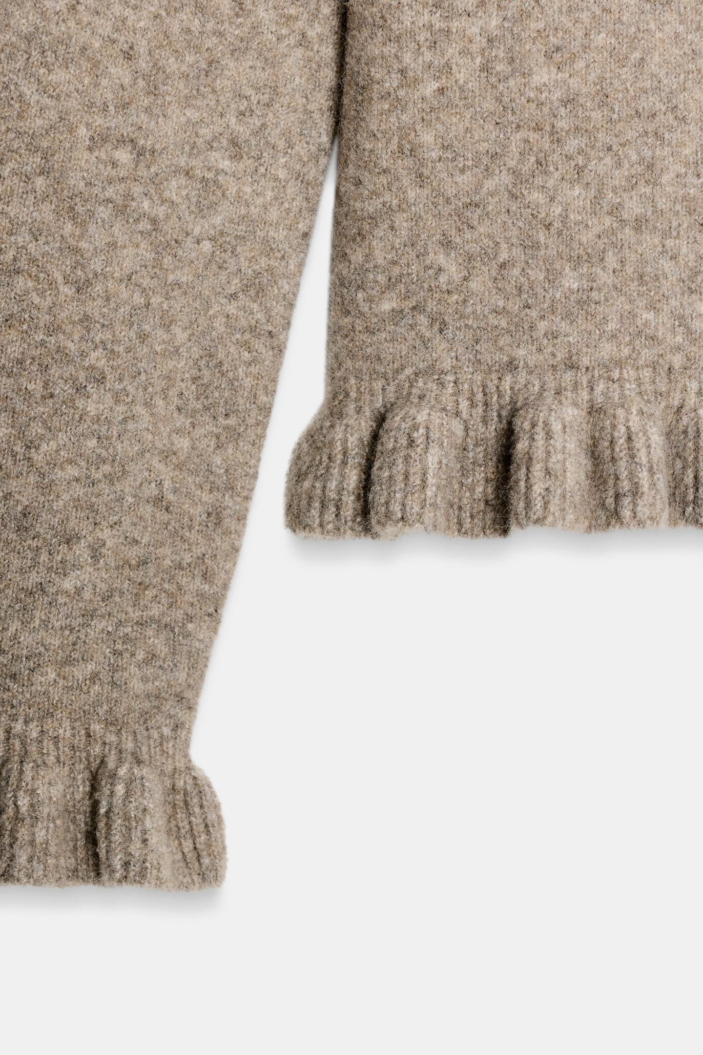 GILET EN MAILLE UNIE À VOLANTS