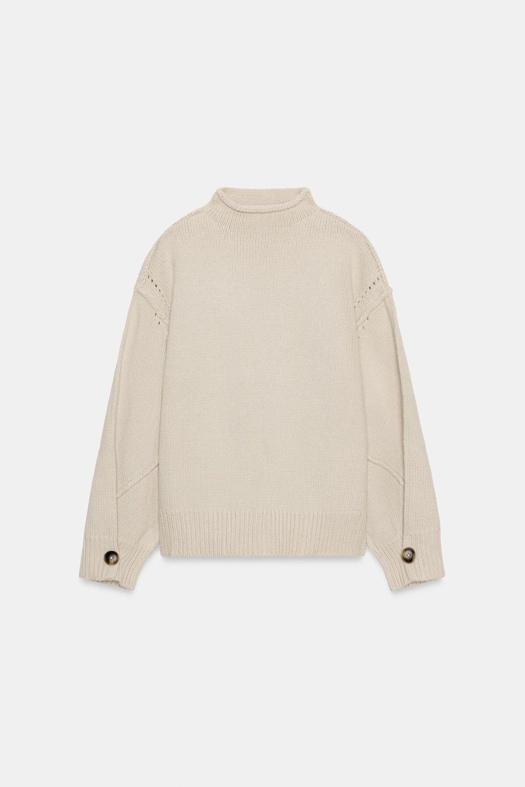 PULL EN MAILLE AVEC COUTURES