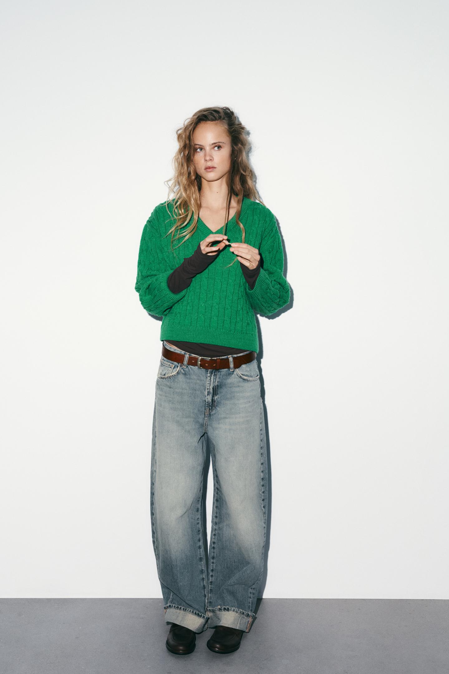 PULL EN V EN MAILLE À TORSADES