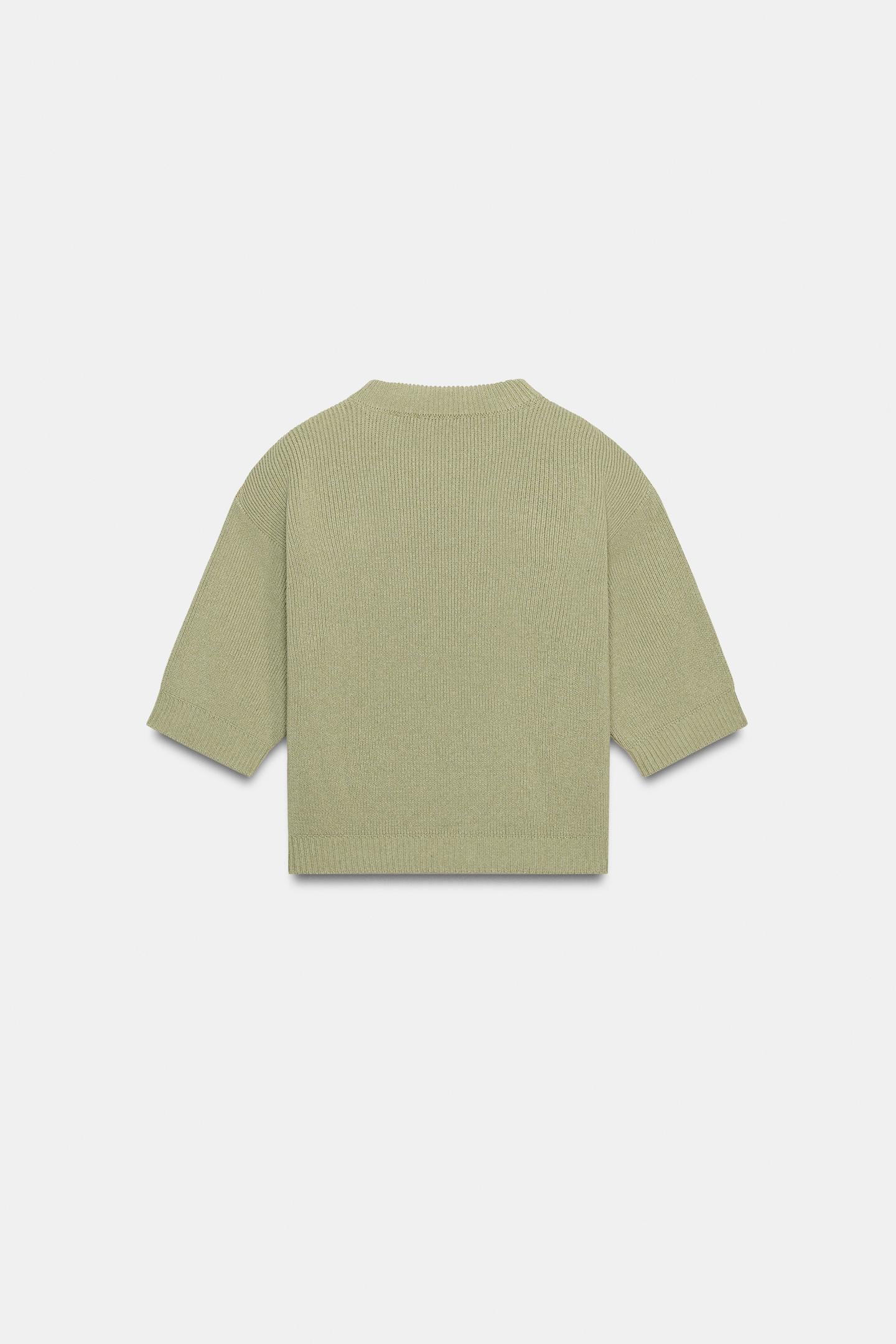 PULL EN MAILLE AVEC ÉPAULETTES